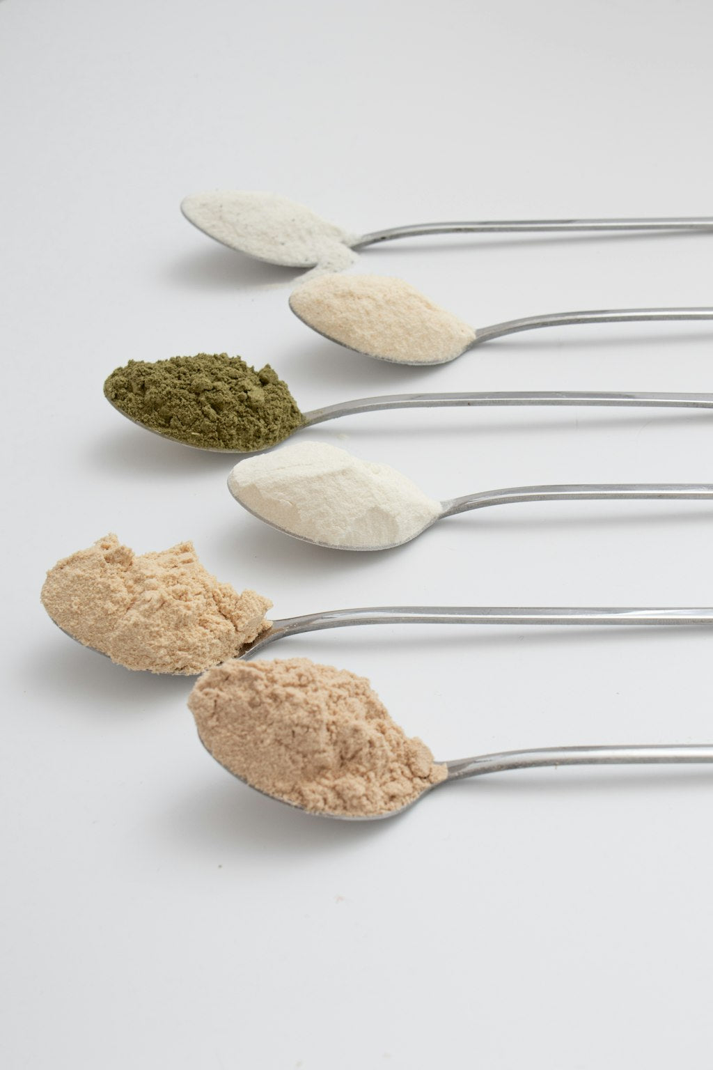 spoons showcasing Aglow powders